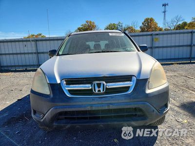 Piąte zdjęcie samochodu w środku: 2004 HONDA CR-V LX VIN:SHSRD78434U239019 - miniatura