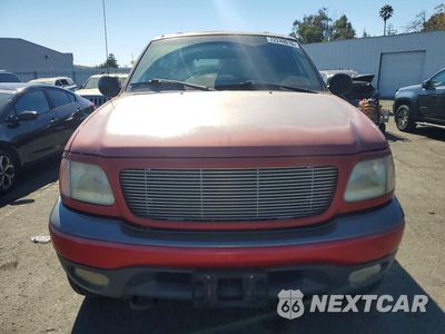 Piąte zdjęcie samochodu w środku: 1999 FORD EXPEDITION VIN:1FMPU18L3XLC01029 - miniatura