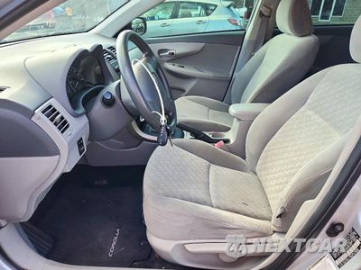 Zdjęcie 7 z 13 samochodu: 2009 TOYOTA COROLLA LE VIN:JTDBL40E499067695 - miniatura