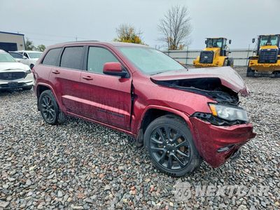 Czwarte zdjęcie samochodu z boku: 2019 JEEP GRAND CHEROKEE LAREDO VIN:1C4RJFAG7KC662078 - miniatura