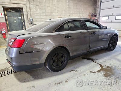 Trzecie zdjęcie samochodu z tyłu: 2015 FORD TAURUS POLICE INTERCEPTOR VIN:1FAHP2MK3FG168047 - miniatura