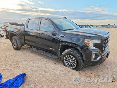 Czwarte zdjęcie samochodu z boku: 2021 GMC SIERRA K1500 AT4 VIN:3GTP9EEL7MG404032 - miniatura