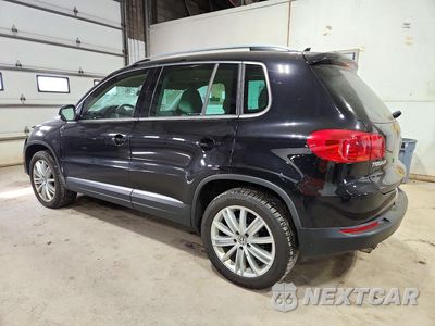 Drugie zdjęcie samochodu z przodu: 2014 VOLKSWAGEN TIGUAN S VIN:WVGBV3AX0EW606566 - miniatura