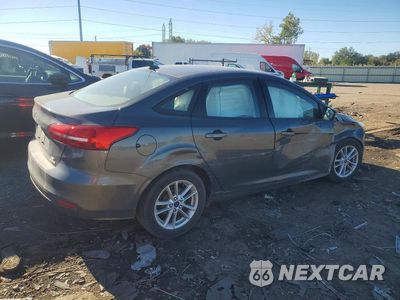 Trzecie zdjęcie samochodu z tyłu: 2016 FORD FOCUS SE VIN:1FADP3F22GL394574 - miniatura