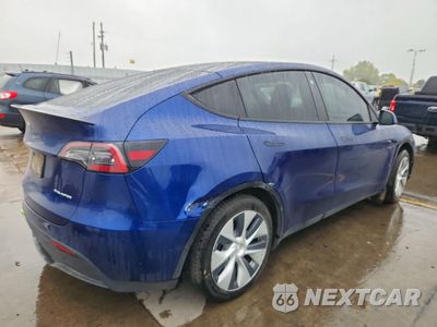 Trzecie zdjęcie samochodu z tyłu: 2022 TESLA MODEL Y VIN:7SAYGDEE8NF323332 - miniatura