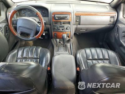Zdjęcie 8 z 12 samochodu: 1999 JEEP GRAND CHEROKEE VIN:1J4GW68N6XC638966 - miniatura