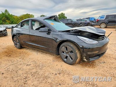 Czwarte zdjęcie samochodu z boku: 2023 TESLA MODEL 3 VIN:5YJ3E1EA8PF704304 - miniatura