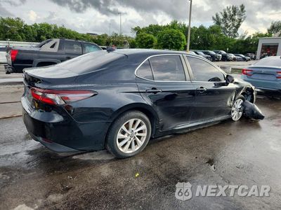 Trzecie zdjęcie samochodu z tyłu: 2021 TOYOTA CAMRY LE VIN:4T1C11AK0MU435949 - miniatura