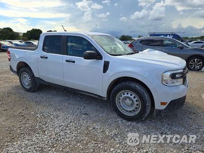 Czwarte zdjęcie samochodu z boku: 2024 FORD MAVERICK XLT VIN:3FTTW8H38RRA37108 - miniatura