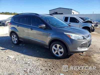 Czwarte zdjęcie samochodu z boku: 2014 FORD ESCAPE SE VIN:1FMCU0G92EUE36379 - miniatura