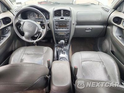 Zdjęcie 8 z 13 samochodu: 2004 HYUNDAI SANTA FE GLS VIN:KM8SC73E24U584959 - miniatura