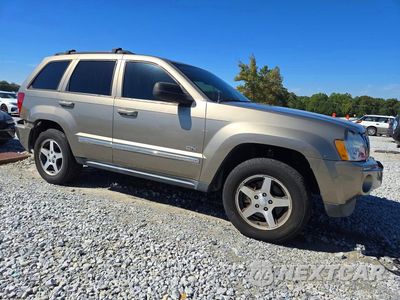 Czwarte zdjęcie samochodu z boku: 2006 JEEP GRAND CHEROKEE LAREDO VIN:1J4GR48K16C316011 - miniatura