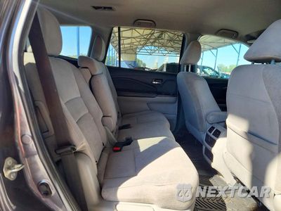 Zdjęcie 10 z 12 samochodu: 2020 HONDA PILOT LX VIN:5FNYF5H12LB026150 - miniatura