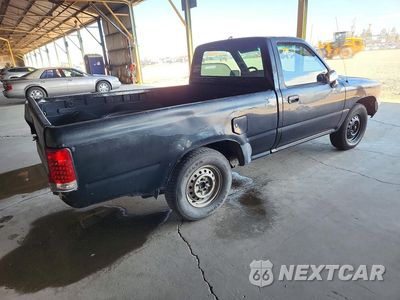 Trzecie zdjęcie samochodu z tyłu: 1995 TOYOTA PICKUP 1/2 TON SHORT WHEELBASE VIN:JT4RN81A6S5204189 - miniatura