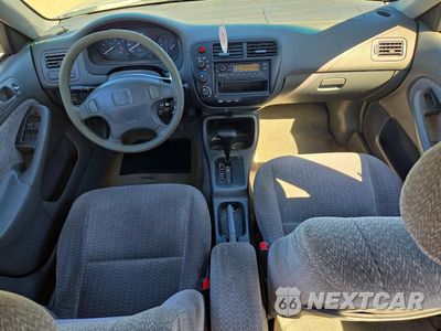 Zdjęcie 8 z 12 samochodu: 1999 HONDA CIVIC LX VIN:2HGEJ6679XH562660 - miniatura