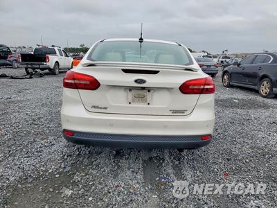 Zdjęcie 6 z 13 samochodu: 2016 FORD FOCUS TITANIUM VIN:1FADP3J27GL232835 - miniatura