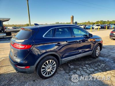 Trzecie zdjęcie samochodu z tyłu: 2018 LINCOLN MKC RESERVE VIN:5LMCJ3C91JUL12692 - miniatura