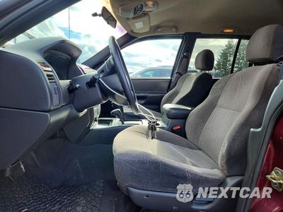 Zdjęcie 7 z 11 samochodu: 2000 JEEP GRAND CHEROKEE LAREDO VIN:1J4GW48S6YC122439 - miniatura