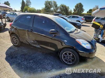Czwarte zdjęcie samochodu z boku: 2009 TOYOTA YARIS BASE VIN:JTDJT903695276113 - miniatura