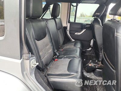 Zdjęcie 10 z 12 samochodu: 2015 JEEP WRANGLER UNLIMITED SPORT VIN:1C4BJWDG1FL612649 - miniatura
