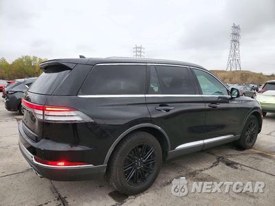 Trzecie zdjęcie samochodu z tyłu: 2021 LINCOLN AVIATOR VIN:5LM5J6XC2MGL03552 - miniatura