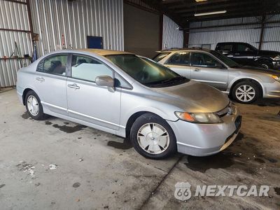 Czwarte zdjęcie samochodu z boku: 2006 HONDA CIVIC HYBRID VIN:JHMFA36276S014121 - miniatura
