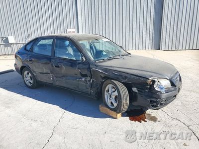 Czwarte zdjęcie samochodu z boku: 2005 HYUNDAI ELANTRA GLS VIN:KMHDN56D55U171302 - miniatura