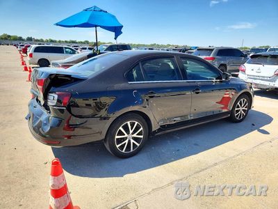 Trzecie zdjęcie samochodu z tyłu: 2017 VOLKSWAGEN JETTA SE VIN:3VWDB7AJ2HM355916 - miniatura