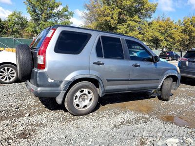 Trzecie zdjęcie samochodu z tyłu: 2006 HONDA CR-V LX VIN:JHLRD78586C029339 - miniatura