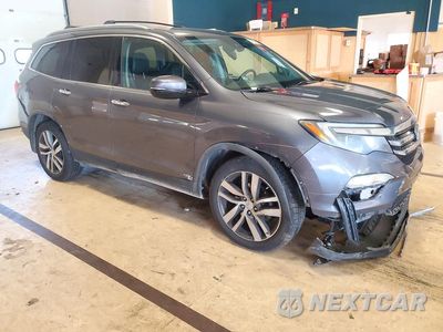 Czwarte zdjęcie samochodu z boku: 2017 HONDA PILOT ELITE VIN:5FNYF6H00HB104705 - miniatura