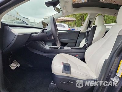 Zdjęcie 7 z 12 samochodu: 2023 TESLA MODEL Y VIN:7SAYGDEF1PF751481 - miniatura