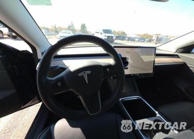 Zdjęcie 9 z 14 samochodu: 2021 TESLA MODEL 3 VIN:5YJ3E1EA9MF090469 - miniatura