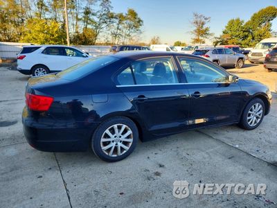 Trzecie zdjęcie samochodu z tyłu: 2014 VOLKSWAGEN JETTA SE VIN:3VWD17AJ2EM325149 - miniatura