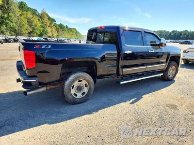Trzecie zdjęcie samochodu z tyłu: 2019 CHEVROLET SILVERADO K2500 HEAVY DUTY LTZ VIN:1GC1KTEY4KF267575 - miniatura