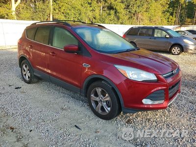 Czwarte zdjęcie samochodu z boku: 2014 FORD ESCAPE SE VIN:1FMCU9GX1EUC34104 - miniatura