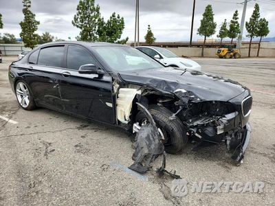 Czwarte zdjęcie samochodu z boku: 2014 BMW 750 LI VIN:WBAYE8C55ED134249 - miniatura