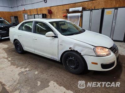 Czwarte zdjęcie samochodu z boku: 2007 VOLKSWAGEN JETTA WOLFSBURG VIN:3VWEG71K17M070363 - miniatura