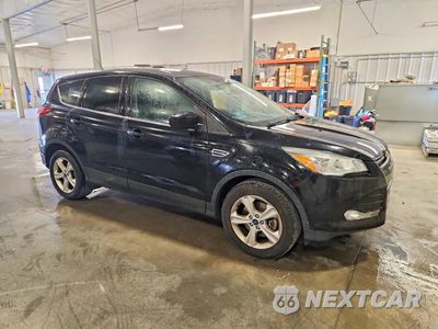 Czwarte zdjęcie samochodu z boku: 2016 FORD ESCAPE SE VIN:1FMCU9GX6GUC11677 - miniatura