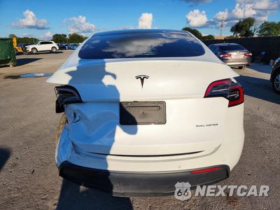 Zdjęcie 6 z 12 samochodu: 2022 TESLA MODEL Y VIN:7SAYGAEE9NF515647 - miniatura