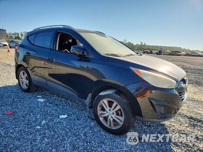 Czwarte zdjęcie samochodu z boku: 2011 HYUNDAI TUCSON GLS VIN:KM8JU3ACXBU276177 - miniatura