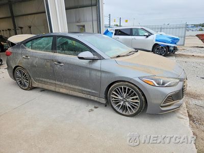 Czwarte zdjęcie samochodu z boku: 2018 HYUNDAI ELANTRA SPORT VIN:KMHD04LB1JU535897 - miniatura