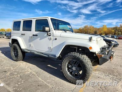 Czwarte zdjęcie samochodu z boku: 2012 JEEP WRANGLER UNLIMITED SAHARA VIN:1C4BJWEG6CL205341 - miniatura