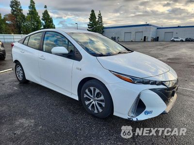 Czwarte zdjęcie samochodu z boku: 2021 TOYOTA PRIUS PRIME LE VIN:JTDKAMFP6M3192319 - miniatura