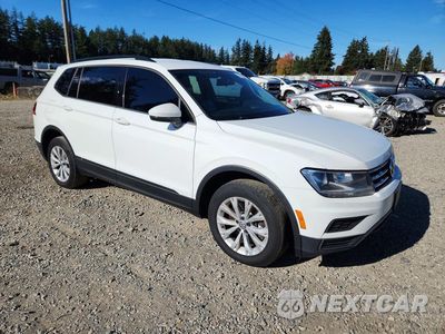 Czwarte zdjęcie samochodu z boku: 2018 VOLKSWAGEN TIGUAN S VIN:3VV0B7AX9JM158710 - miniatura