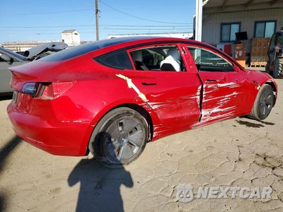 Trzecie zdjęcie samochodu z tyłu: 2023 TESLA MODEL 3 VIN:5YJ3E1EA8PF614716 - miniatura