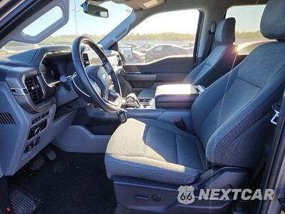 Zdjęcie 7 z 12 samochodu: 2024 FORD F150 LIGHTNING XLT VIN:1FTVW3LK0RWG20523 - miniatura