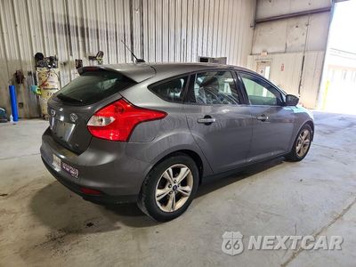 Trzecie zdjęcie samochodu z tyłu: 2012 FORD FOCUS SE VIN:1FAHP3K29CL471751 - miniatura
