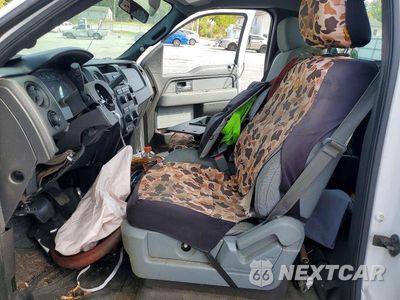 Zdjęcie 7 z 12 samochodu: 2014 FORD F150 VIN:1FTMF1CM1EKE11567 - miniatura