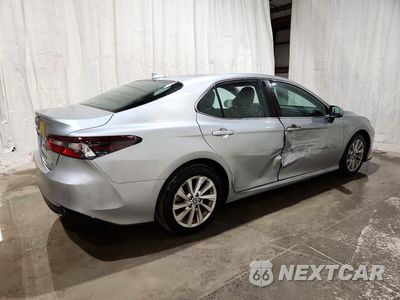 Trzecie zdjęcie samochodu z tyłu: 2022 TOYOTA CAMRY LE VIN:4T1C11AKXNU009574 - miniatura