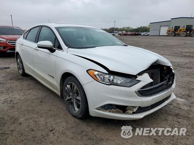 Czwarte zdjęcie samochodu z boku: 2018 FORD FUSION SE HYBRID VIN:3FA6P0LU1JR249144 - miniatura